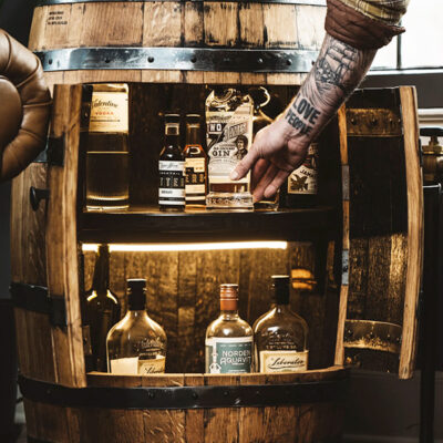 Whiskey barrel liquor cabinet